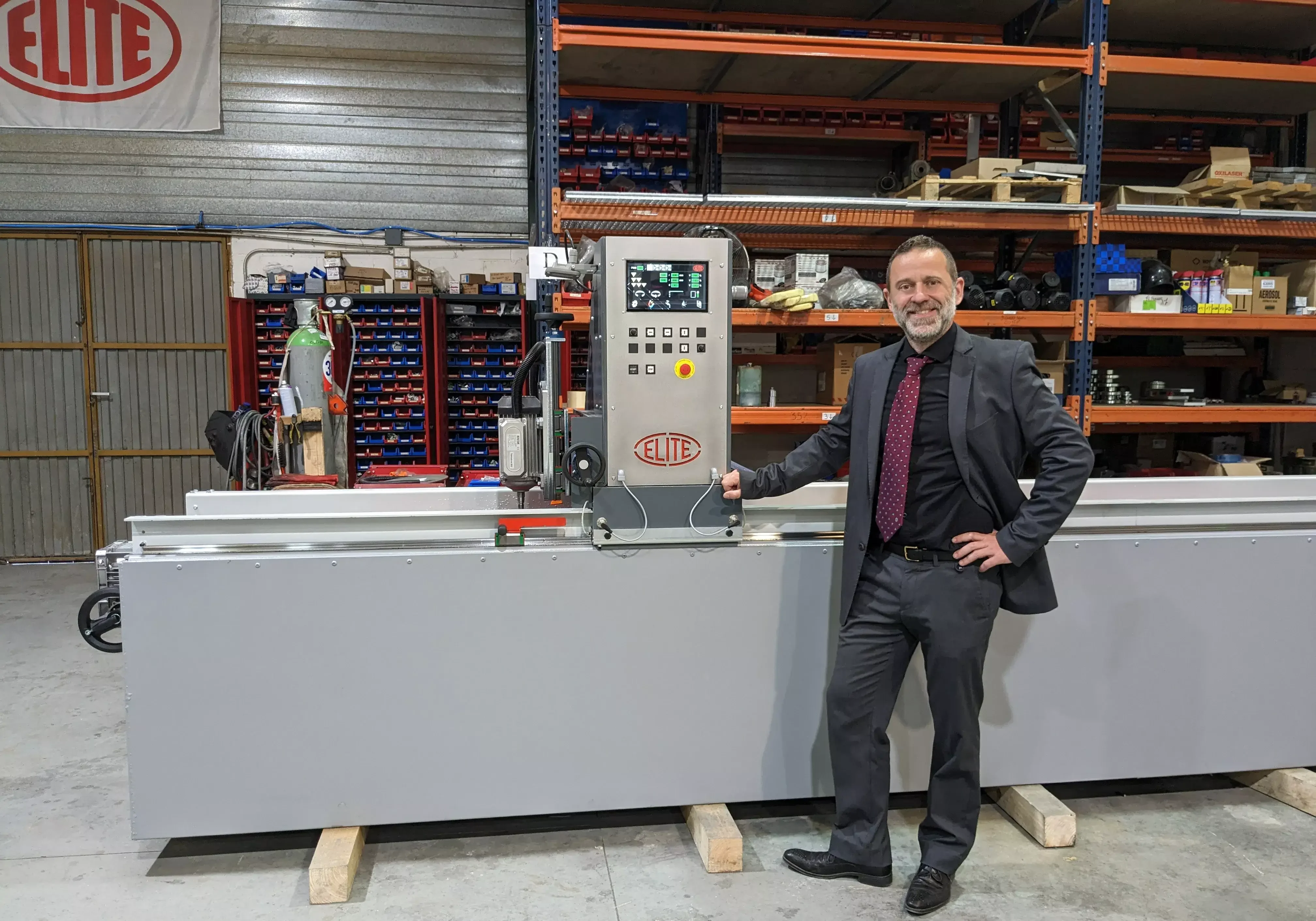 ELITE CEO Sergi Valls with a blade grinding machine ELITE model CU PRO 4000